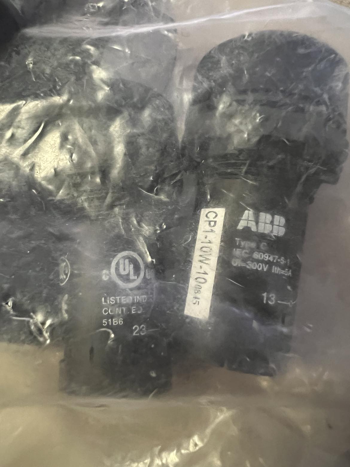 ABB 1SFA619100R1015 - Bag of 10 White Pushbuttons