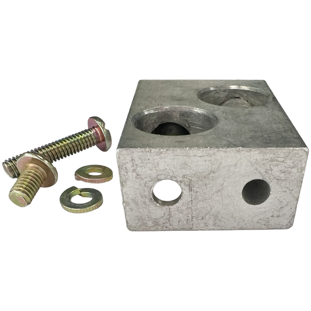 Metal block with two holes and a bolt on a white background