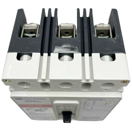 Electrical component with metallic and plastic parts on a white background