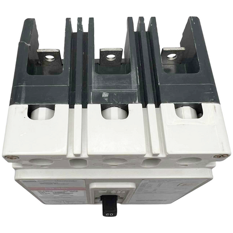 Electrical component with metallic and plastic parts on a white background