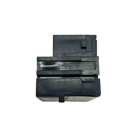 Black rectangular object with cut-out sections on a white background