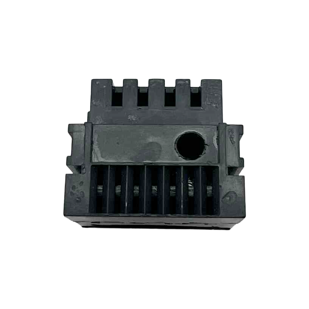 Black plastic component on a white background