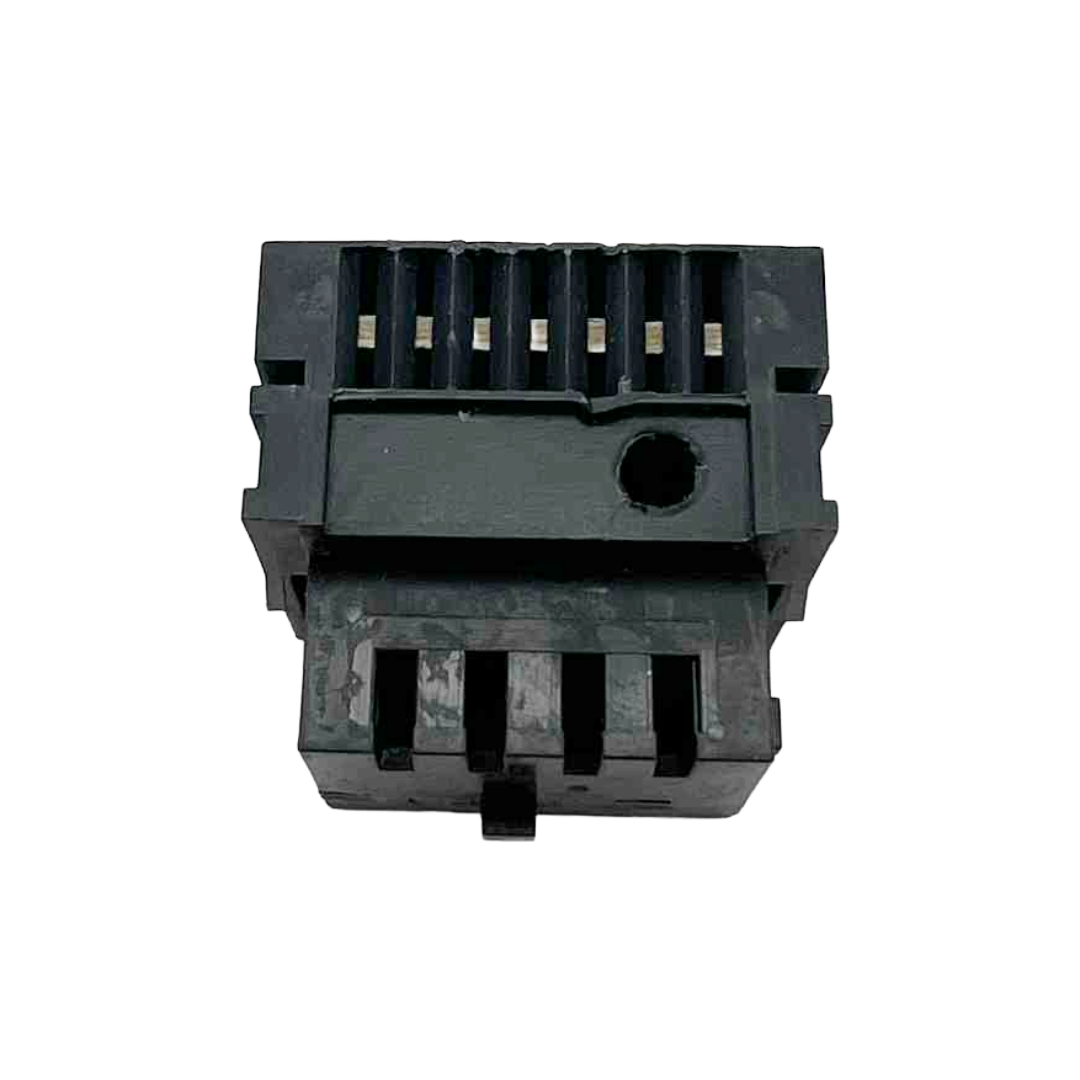 Black plastic component on a white background