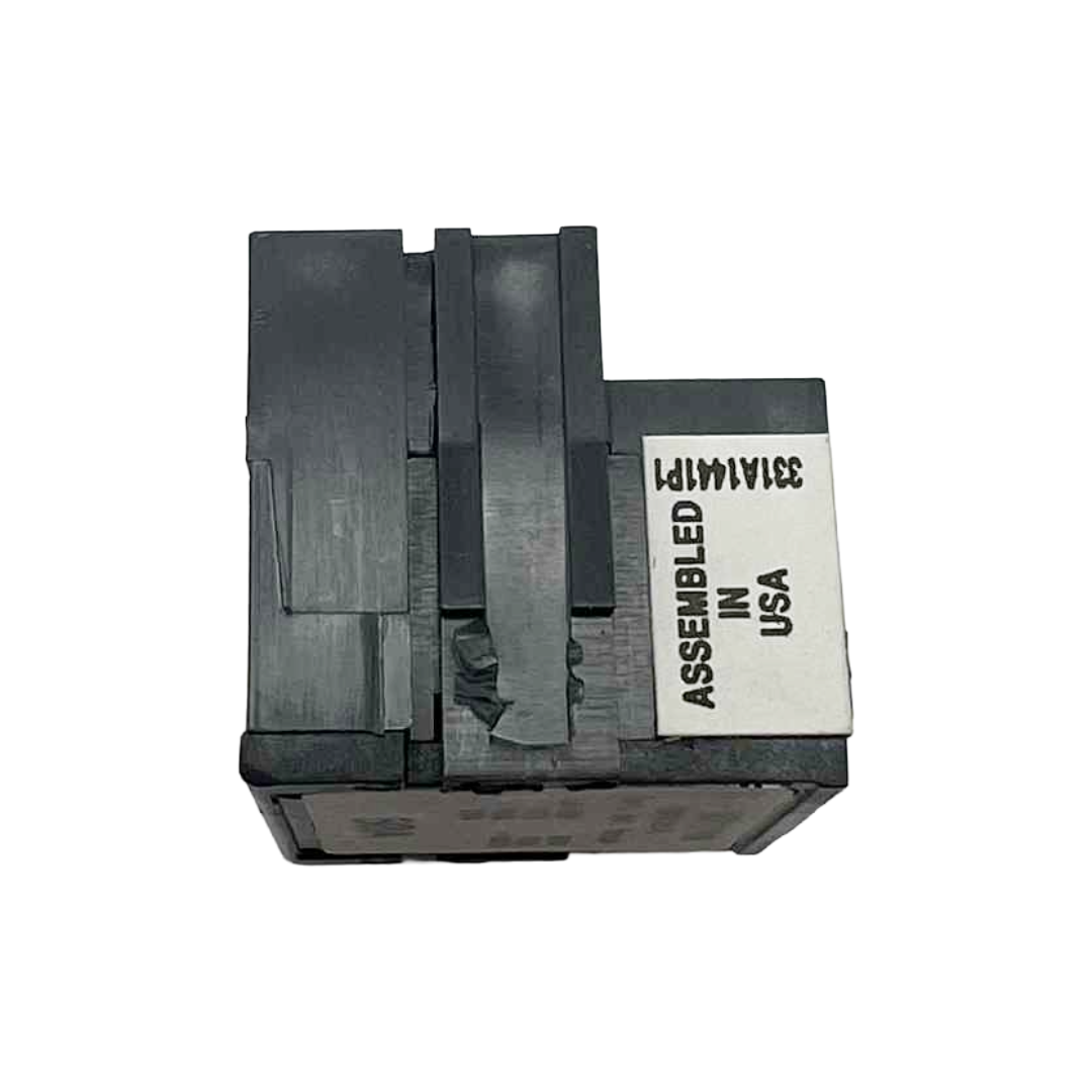 Black metal component with 'Assembled in USA' label on a white background