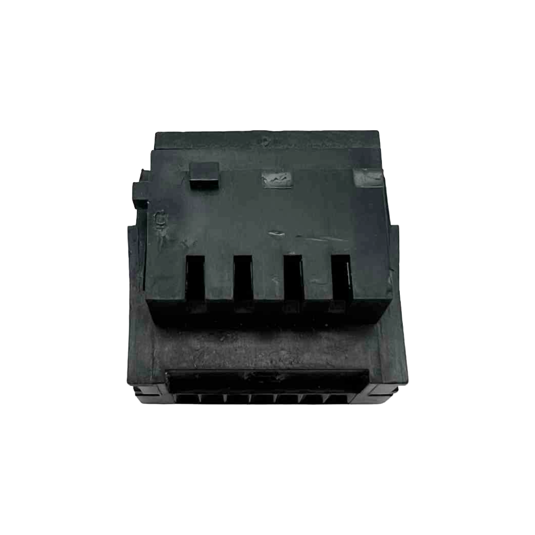 Black plastic component on a white background