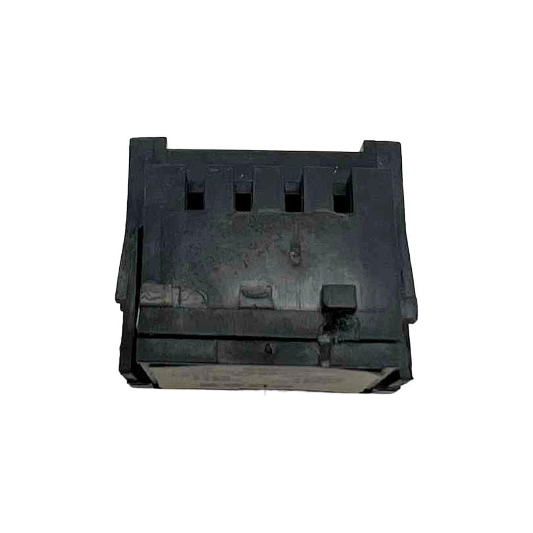 Black plastic component on a white background