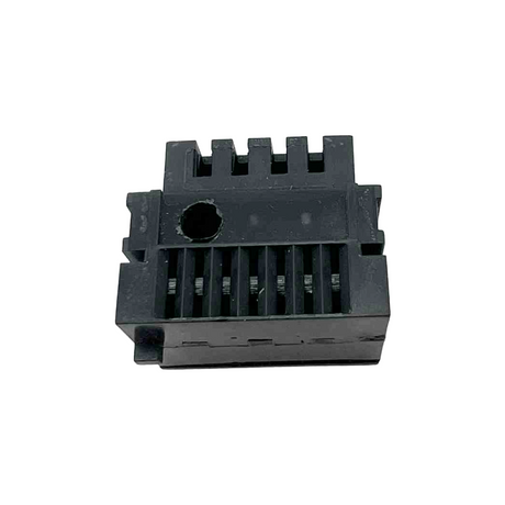 Black plastic component with grooves on a white background