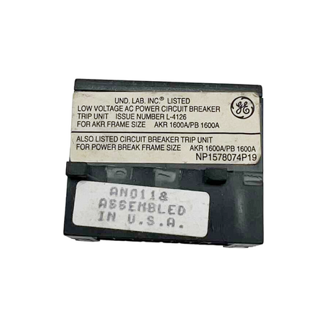 Circuit breaker trip unit with GE logo and text on a white background