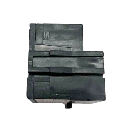 Black plastic component on a white background