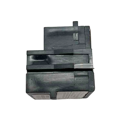 Black plastic component on a white background