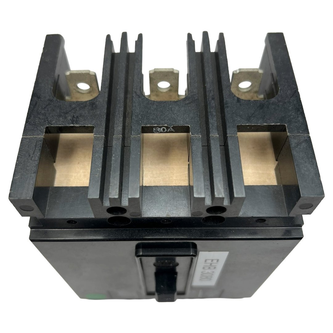 Electrical component with metallic contacts on a white background