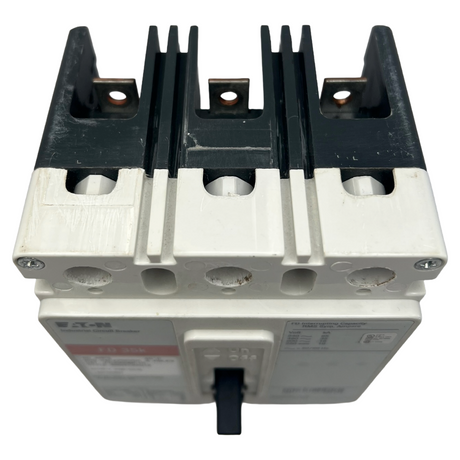 Electrical circuit breaker with metallic and black components on a white background