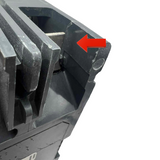 Close-up of a black mechanical component with a red arrow pointing to a specific part on a white background.