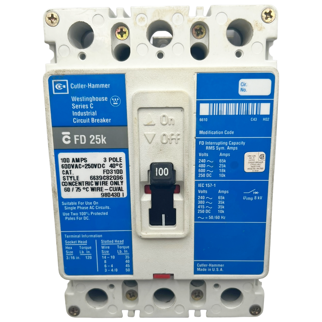 Industrial circuit breaker with blue labels and white casing on a white background