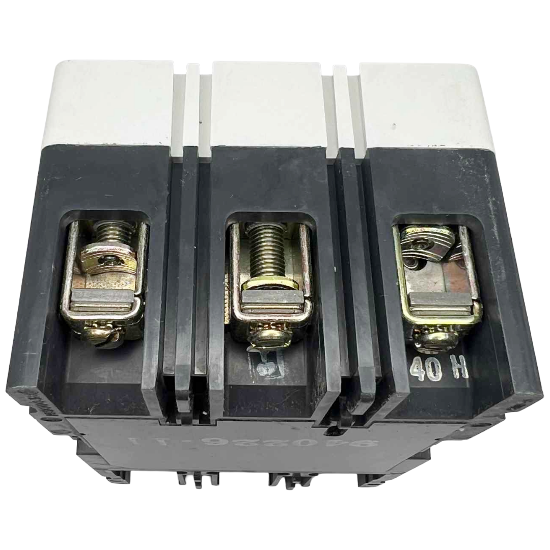 Electrical contactor with three screw terminals on a white background