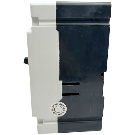 Electrical breaker box with a 'Factory Sealed Breaker' label on a white background