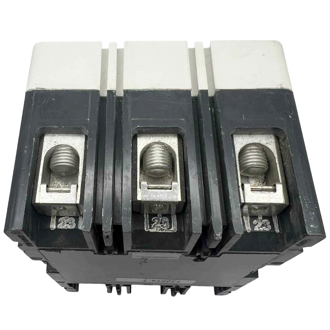 Three-phase electrical breaker on a white background