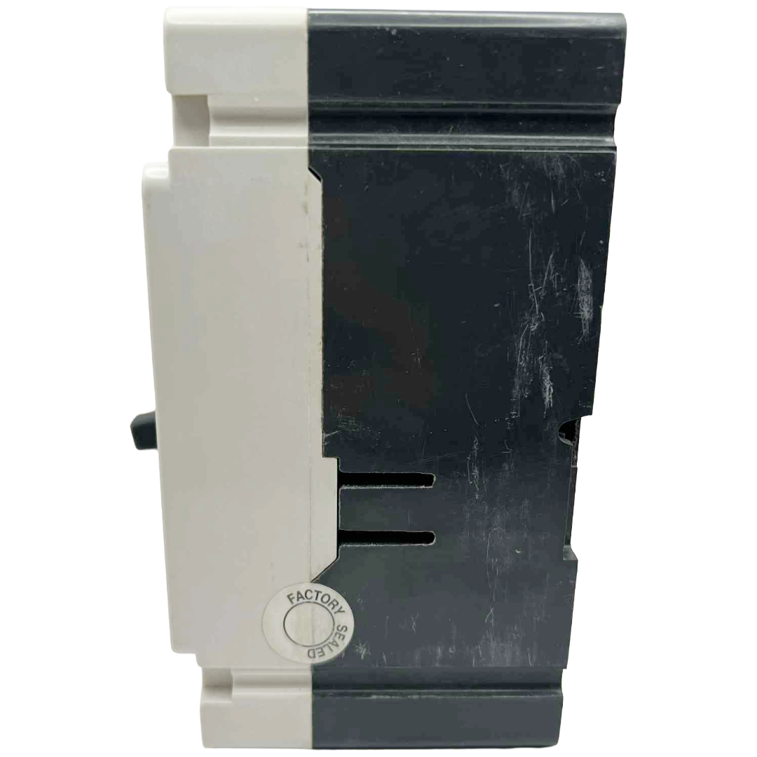 Black and white plastic component with 'Factory Sealed' branding on a white background