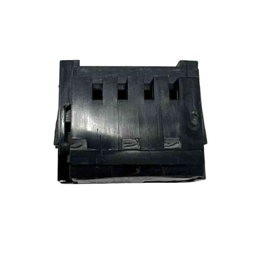 Black plastic component on a white background