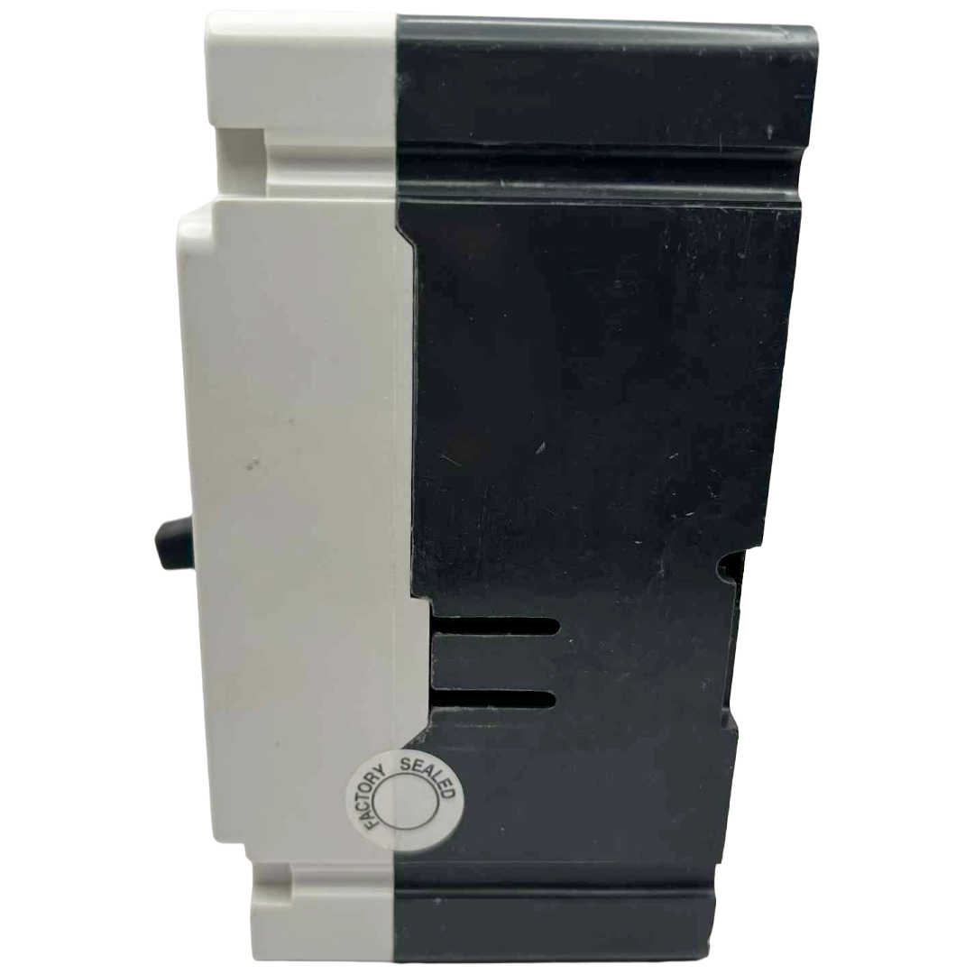 Black and white plastic component with a 'Factory Sealed' label on a white background