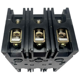 Black electrical circuit breaker with brass contacts on a white background