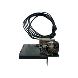 Mechanical component with a black cable on a white background