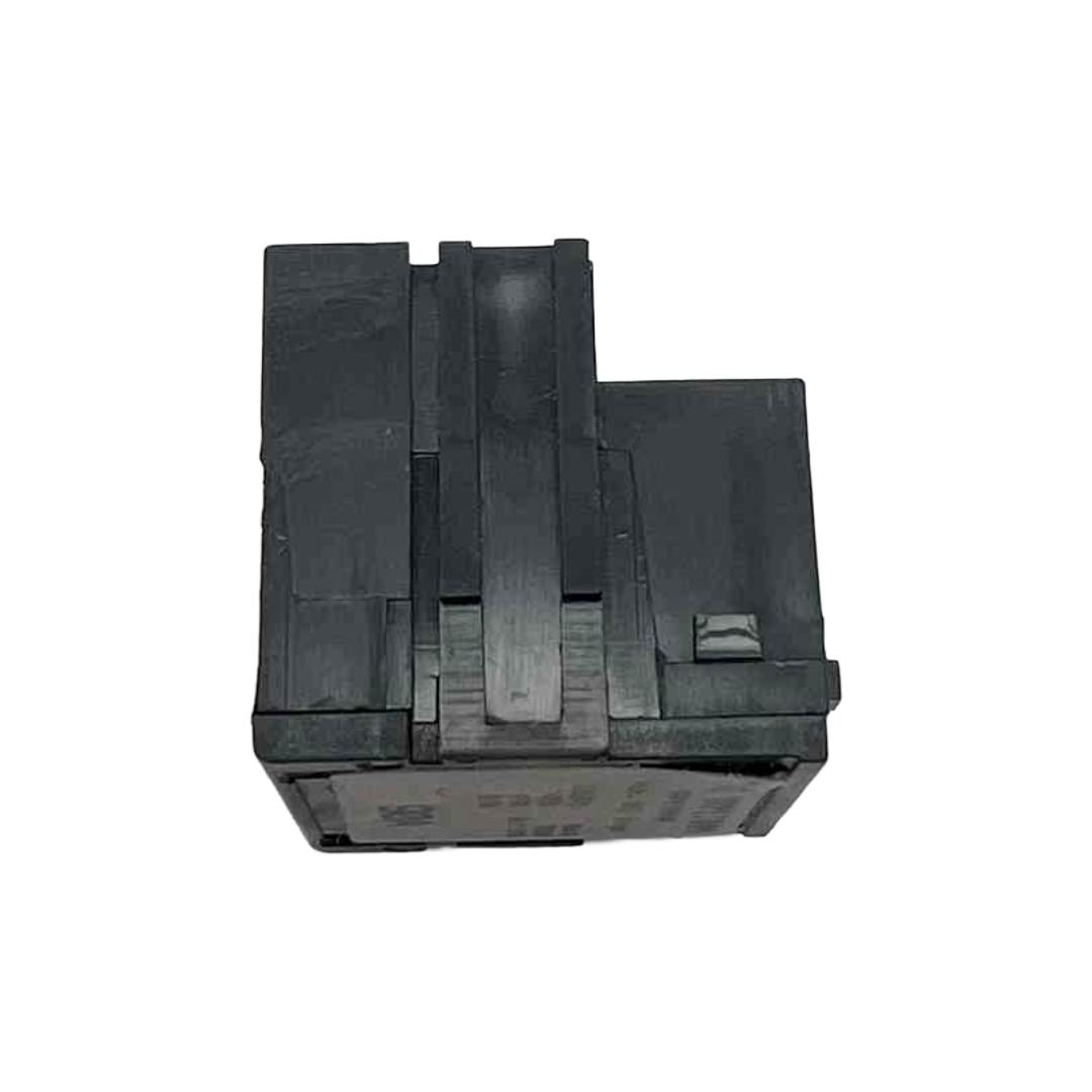 Black plastic component on a white background