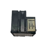 Black electronic component with text on a white background