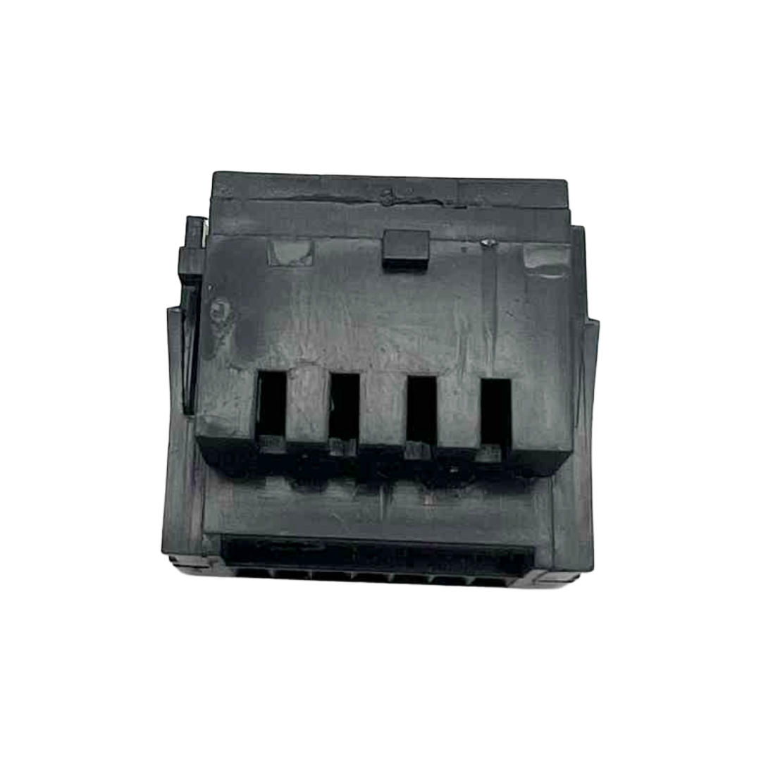 Black plastic component on a white background