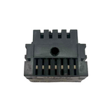 Black plastic component with grooves on a white background