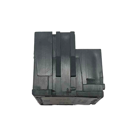 Stack of black metal brackets on a white background