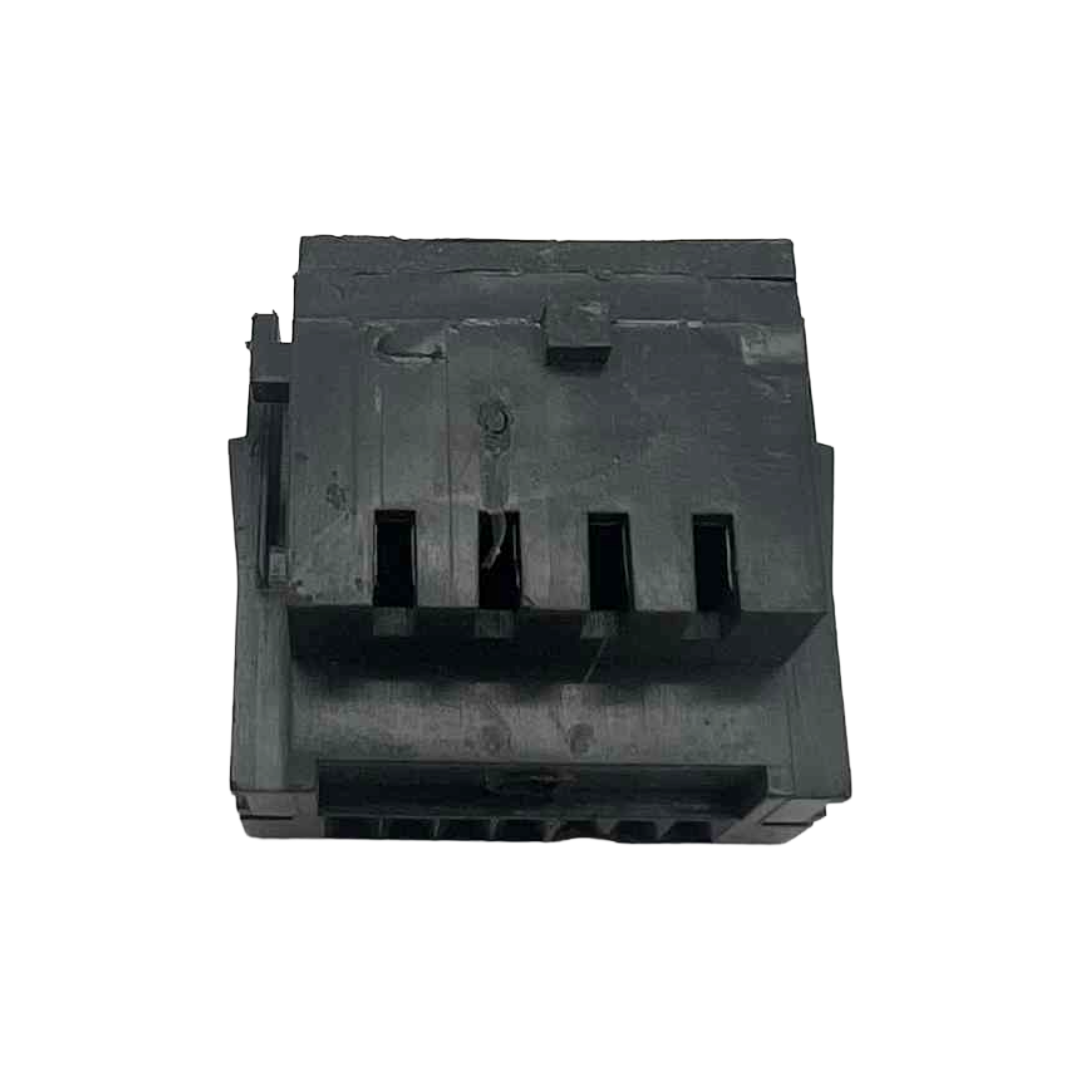 Black plastic component on a white background