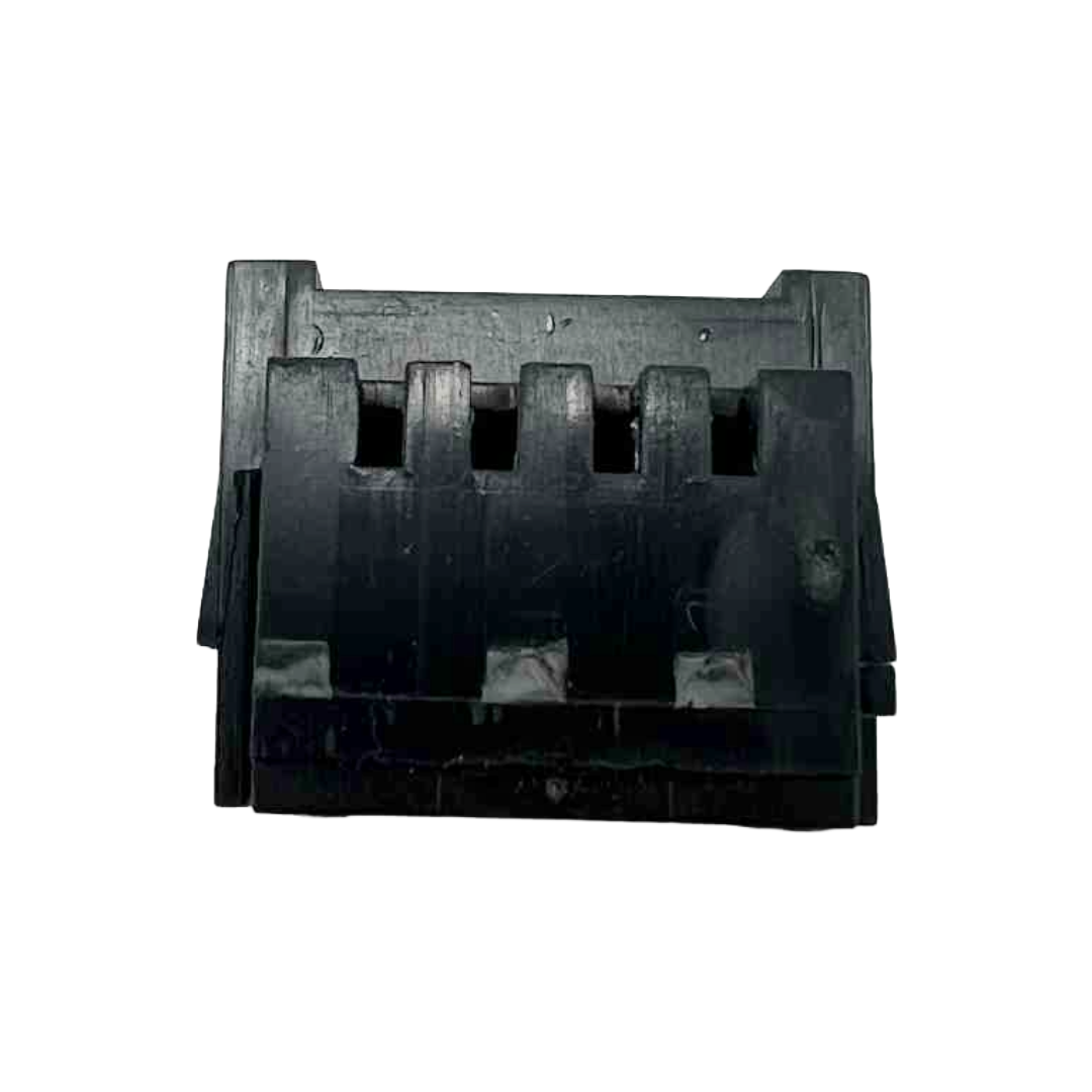 Black plastic component on a white background