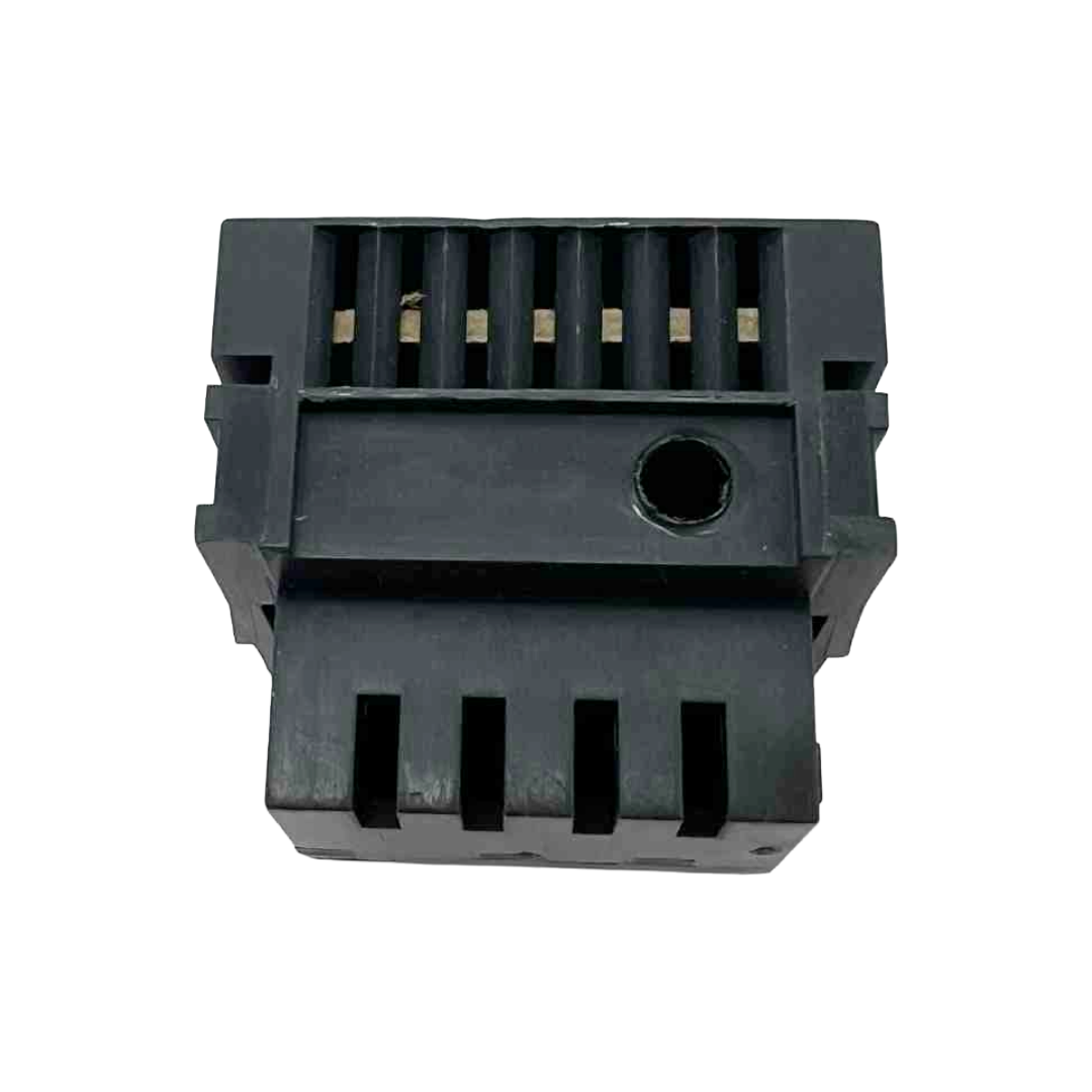 Black plastic component on a white background