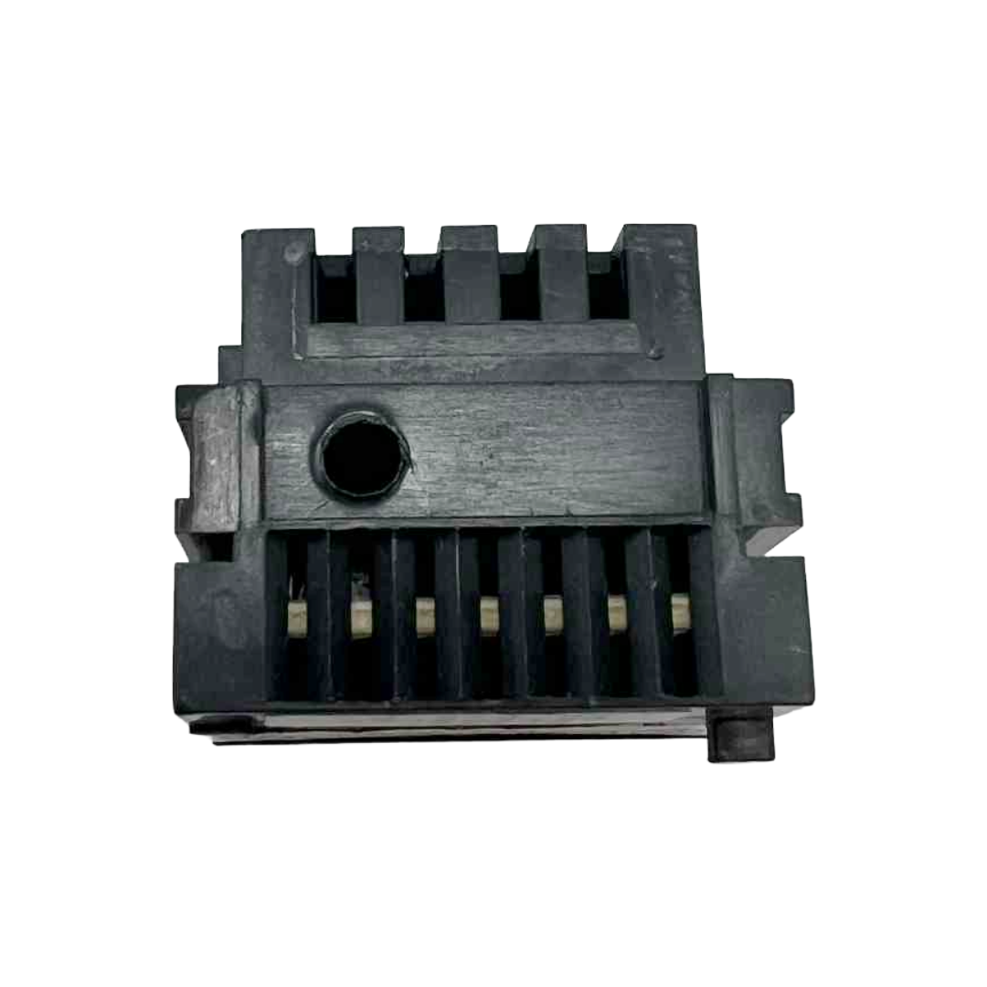 Black mechanical component on a white background