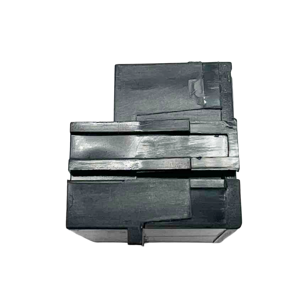 Metallic component on a white background