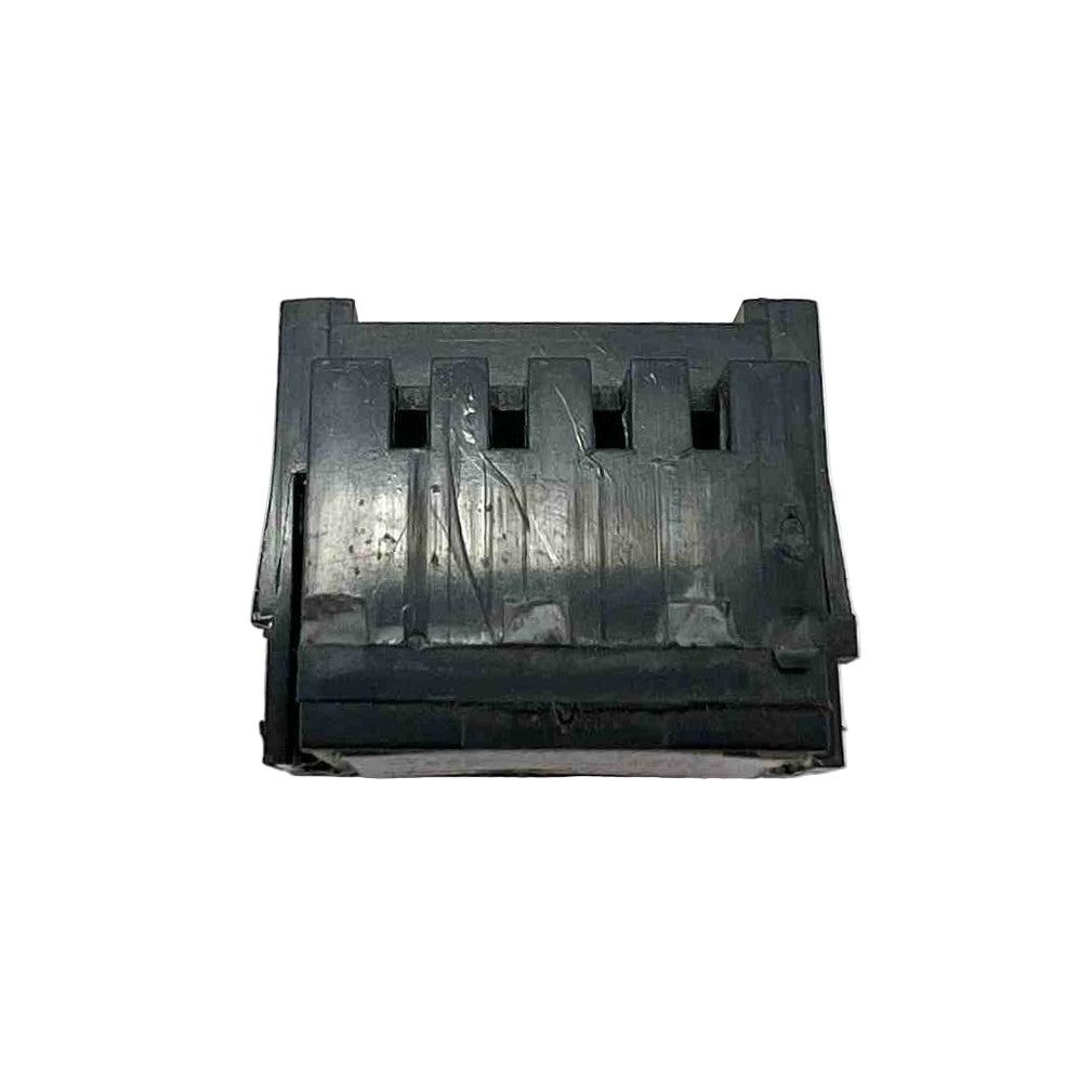 Black plastic component on a white background
