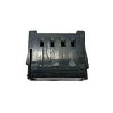 Black plastic component on a white background