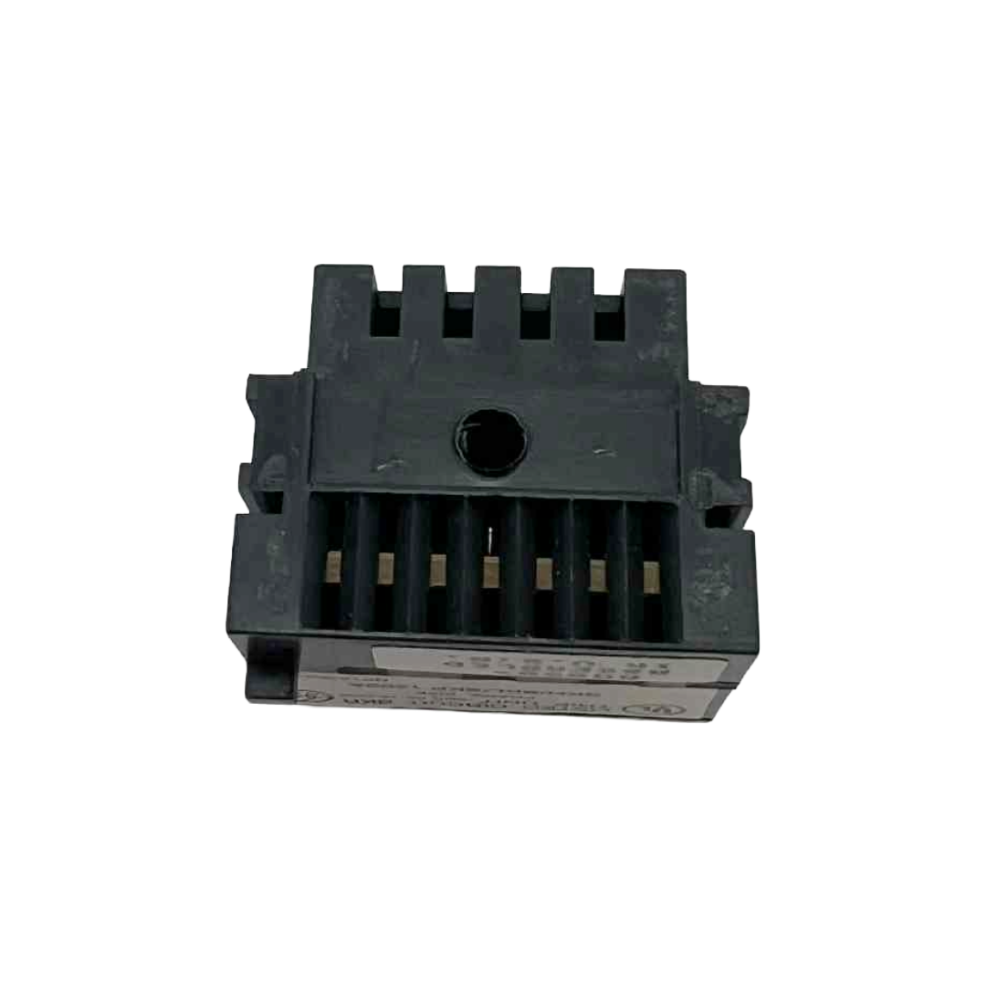 Black plastic component on a white background