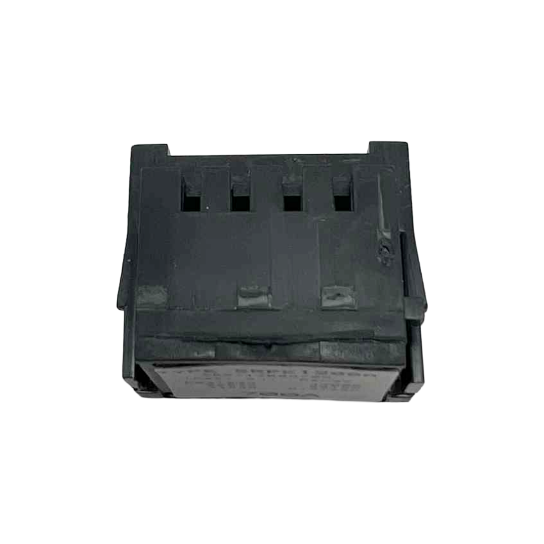 Black plastic component on a white background