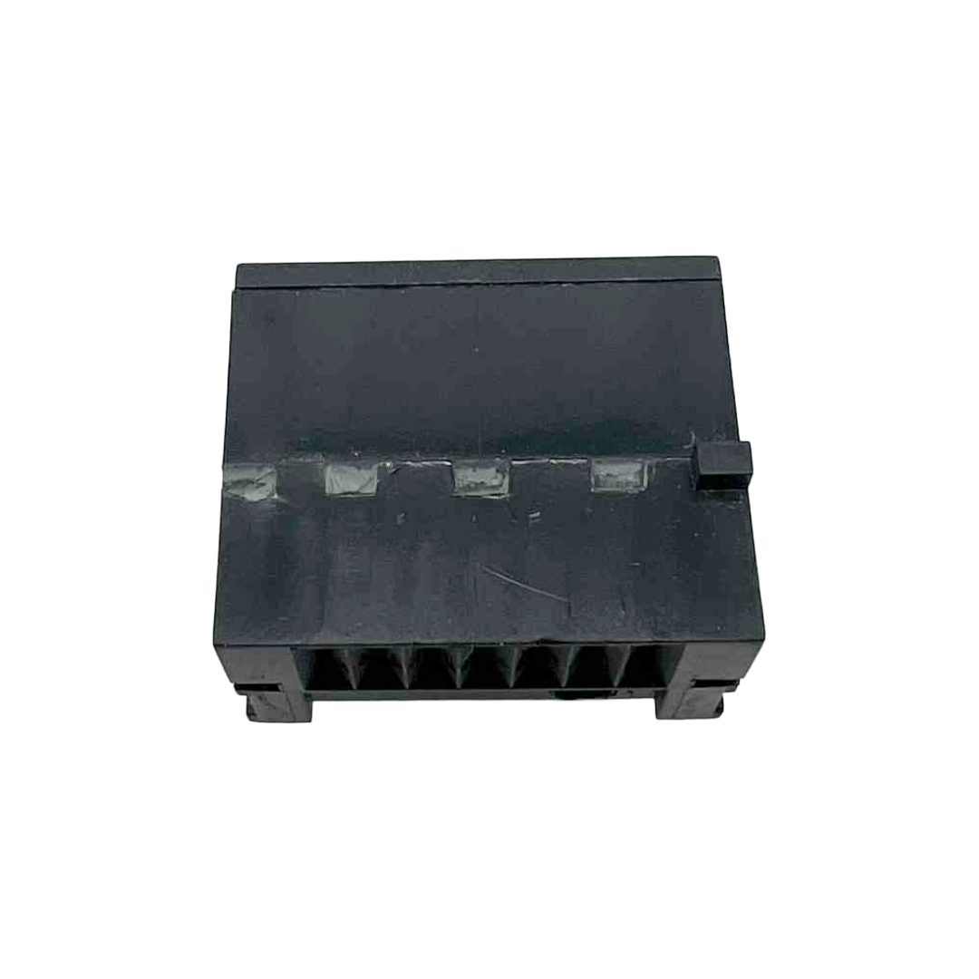 Black plastic component on a white background