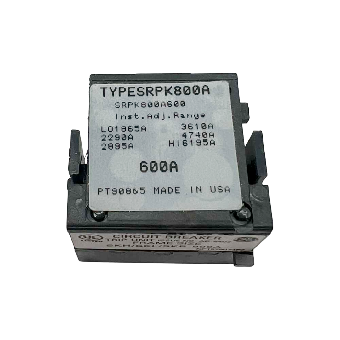 Circuit breaker trip unit with model number on a white background