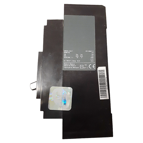 Black electronic component with labels and barcodes on a white background