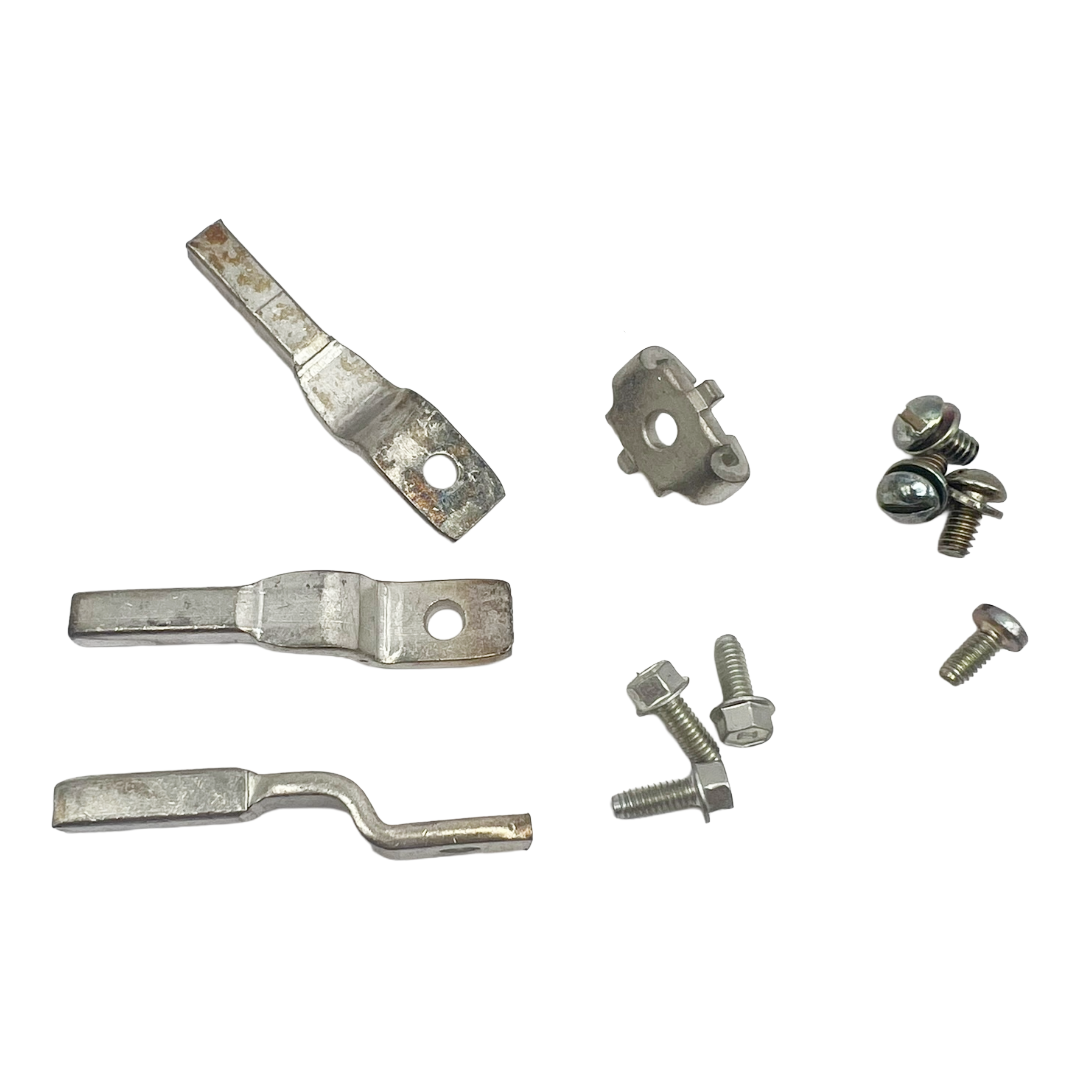 Metal brackets and screws on a white background