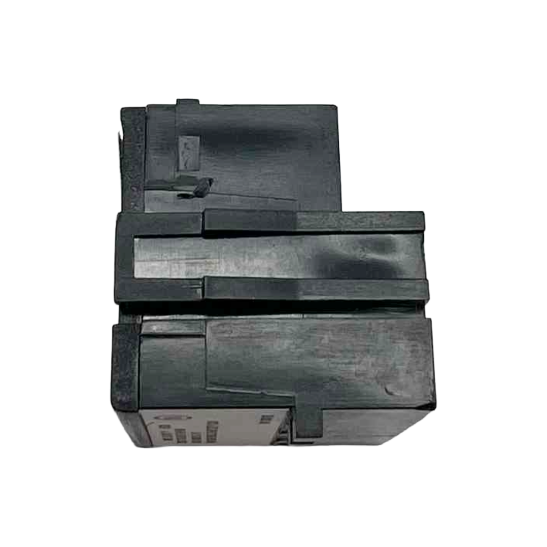 Black mechanical component on a white background