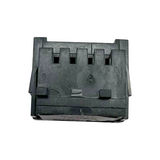 Black plastic component on a white background