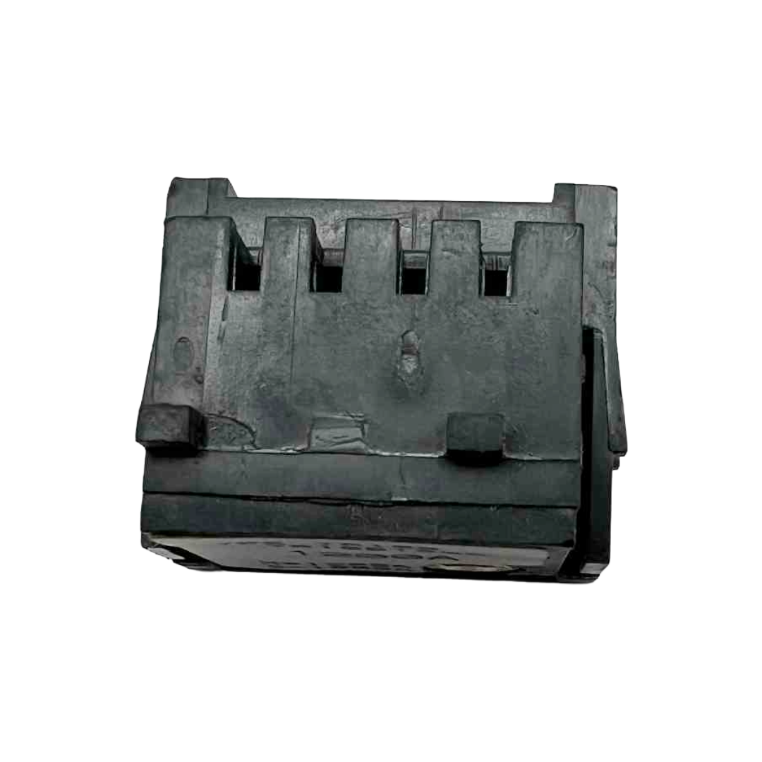 Black plastic component on a white background