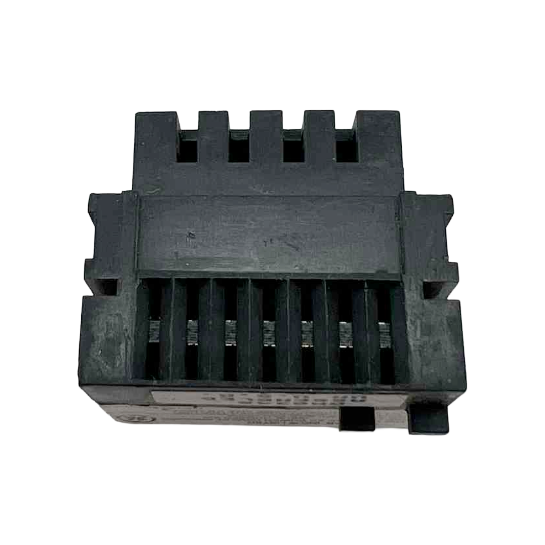 Black plastic component on a white background