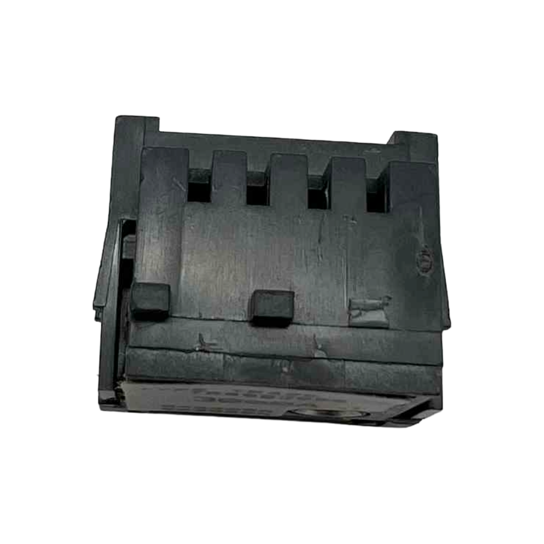 Black plastic component on a white background