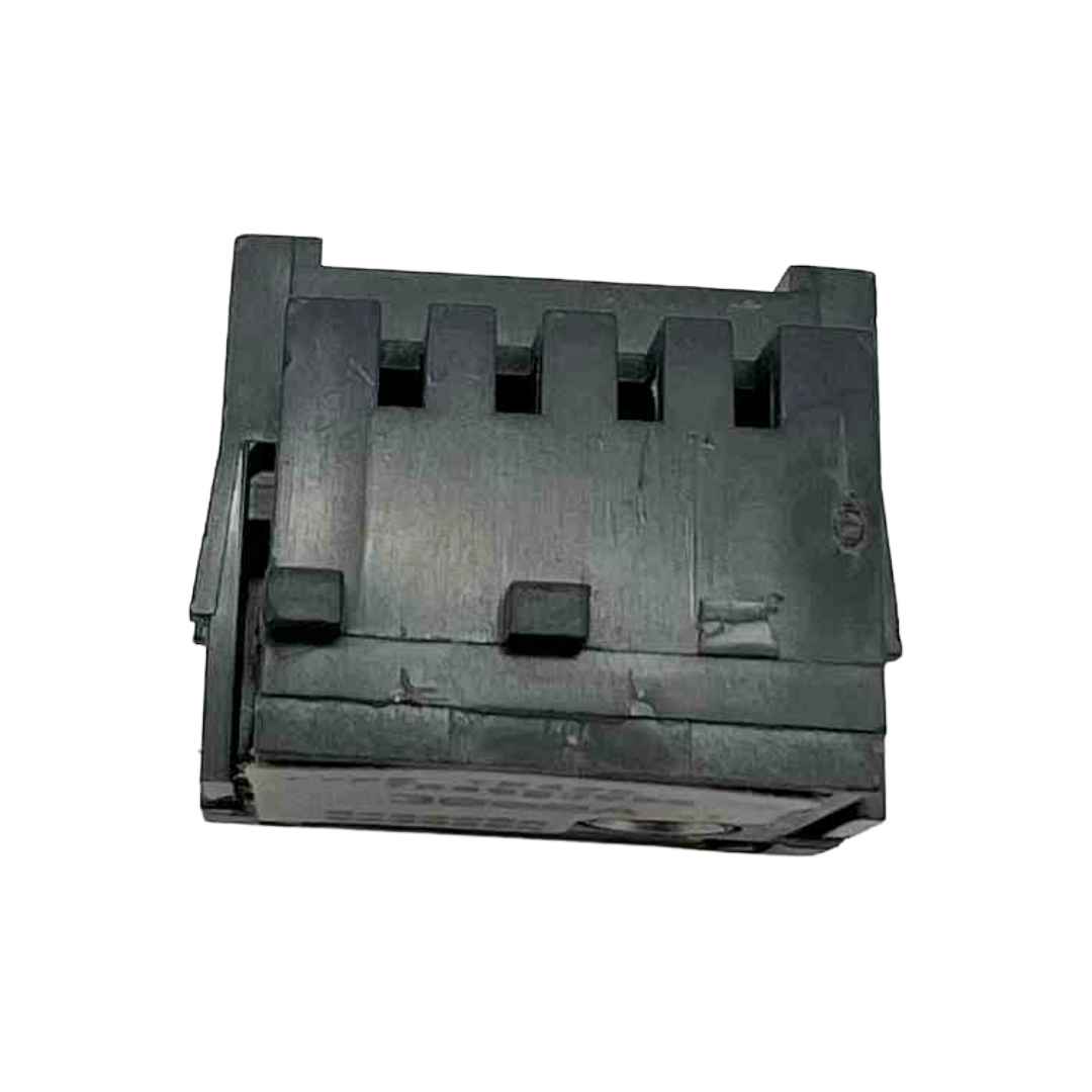 Black plastic component on a white background